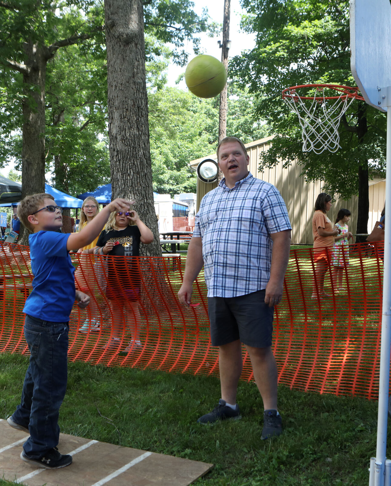 Ayden Joerling shoots a basketball
